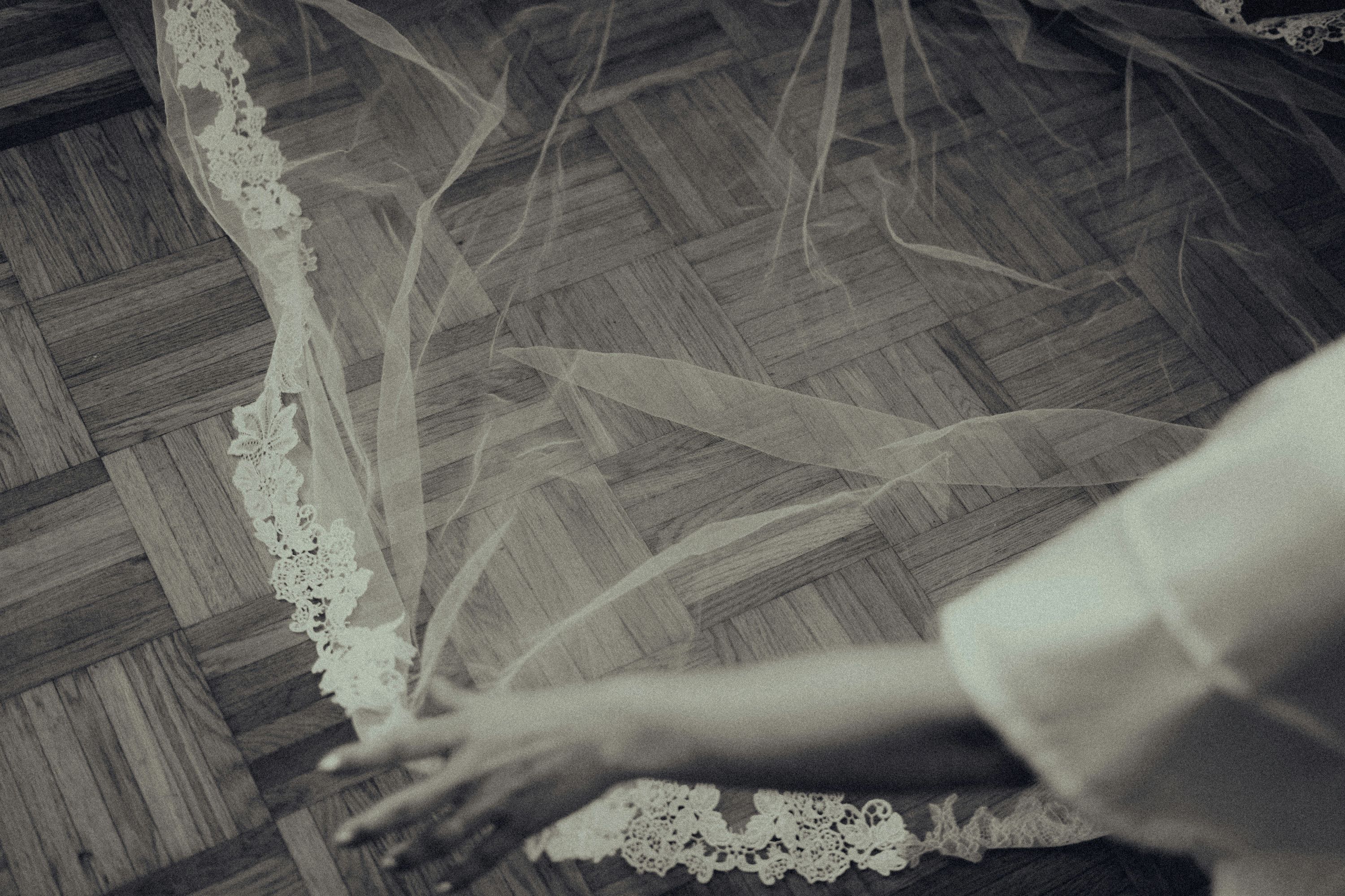 Person in white and brown floral dress